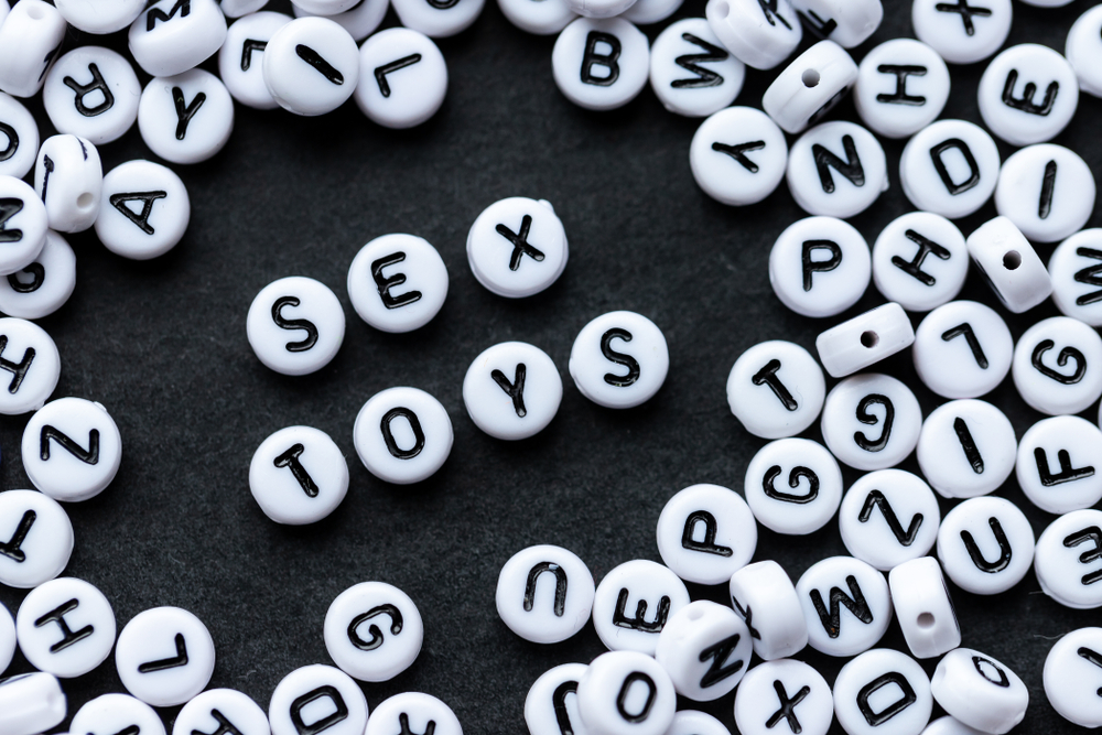 Words,Sex,Toys,Made,From,Small,White,Letters,On,Black